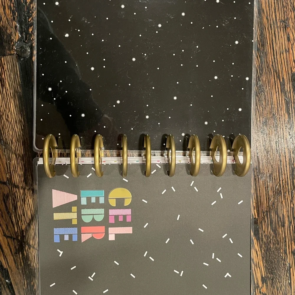 The Happy Planner Colorful Wave Calendar -mix of pages, rings, monthly dividers.